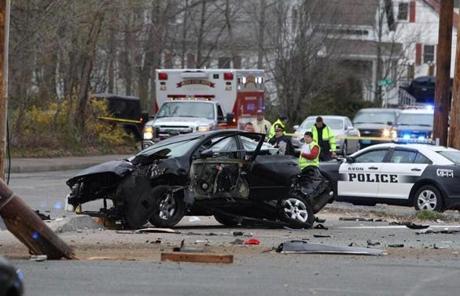 A car crashed into a telephone pole early Monday after catching the attention of police in Brockton.

